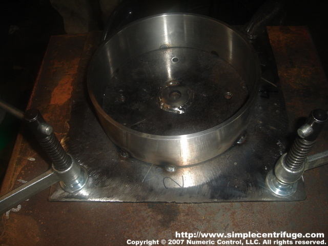 Remove the part from the motor and clamp firmly to the welding table. This is critical to prevent excessive warping.